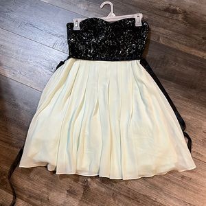 Strapless mint green and black sequin dress with belt